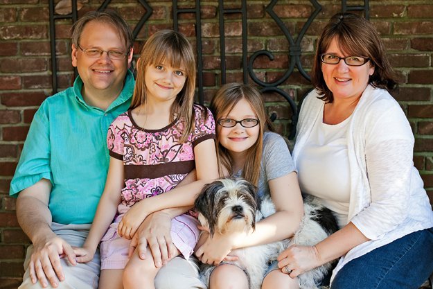 Our family: John (digital communications manager at Youth Villages), Marci (self-employed portrait photographer), Margret (11), Audrey (9), and dog Lexi.