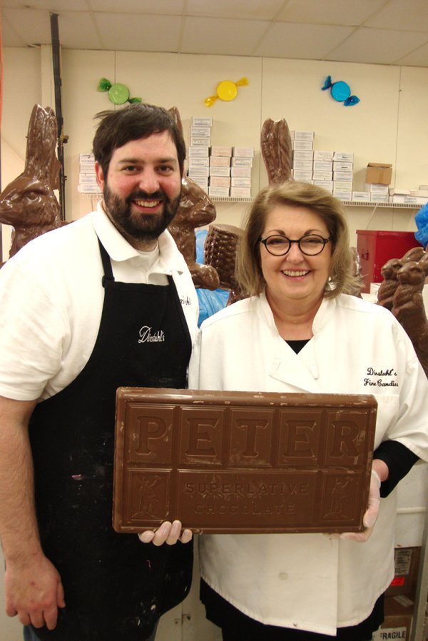 Rebecca and Andrew Dinstuhl, a fifth-generation candy maker. “I love this business,” says Rebecca. “Our slogan is ‘We sell happiness’ because you can’t be sad when you come into a candy store.”